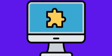 figura de um computador com uma peça de quebra cabeça